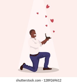 man kneeling holding engagement ring proposing marry him happy valentines day concept african american guy in love marriage offer male full length character flat