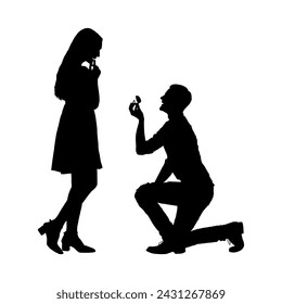 Man kneeling and proposing to a woman vector silhouette.