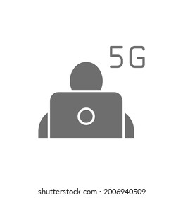 Man at laptop with 5G internet grey icon.