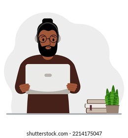 Man with laptop and headphones. Working from home, student, freelancer, assistant, blogger or businessman. Home office concept.