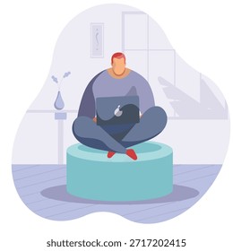 Um homem com um laptop e gráficos do Illustrator à sua frente