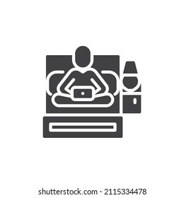 Man with laptop on bed vector icon. filled flat sign for mobile concept and web design. Person using laptop in bedroom glyph icon. Symbol, logo illustration. Vector graphics
