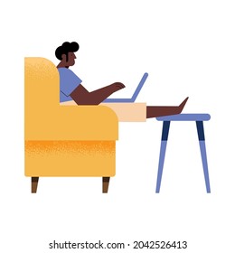 Man with laptop working in couch
