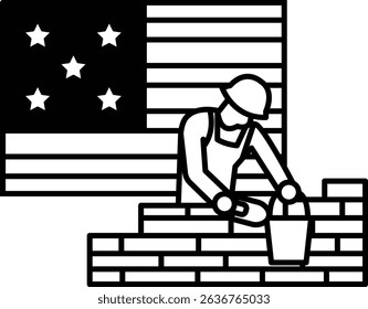 A man is laying bricks on a wall in front of an American flag. The flag is black and white and has stars. The man is wearing a hard hat and he is working on a construction site
