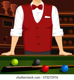 man leaning on a pool table with cue stick and colorful billiard balls
