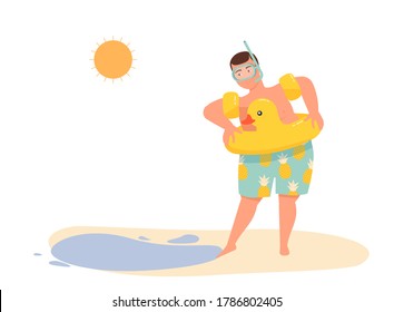 A man with a lifebuoy in oversleeves and a swimming mask touches the water with his foot.