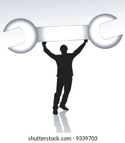 man lifting a spanner 	