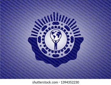 man lifting world icon with denim texture