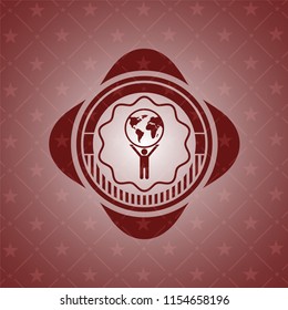 man lifting world icon inside vintage red emblem