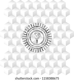 man lifting world icon inside realistic grey emblem with geometric cube white background