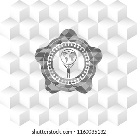 man lifting world icon inside realistic grey emblem with geometric cube white background