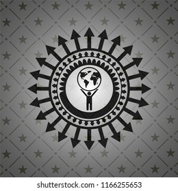 man lifting world icon inside black emblem. Vintage.