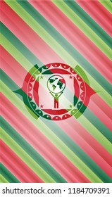 man lifting world icon inside christmas colors style emblem.