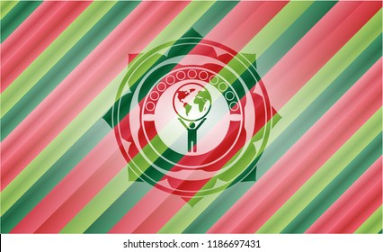 man lifting world icon inside christmas badge background.