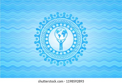 man lifting world icon inside sky blue water emblem background.