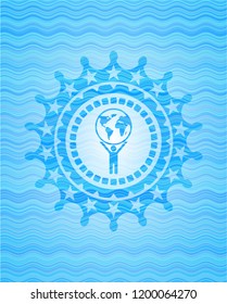 man lifting world icon inside water wave style emblem.