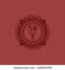 man lifting world icon inside red emblem. Retro