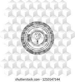 man lifting world icon inside grey emblem with geometric cube white background