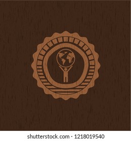 man lifting world icon inside retro style wood emblem