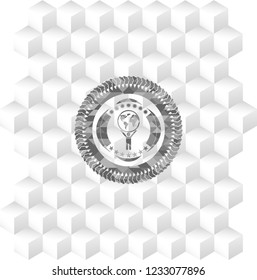 man lifting world icon inside grey emblem. Vintage with geometric cube white background
