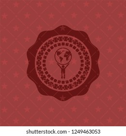 man lifting world icon inside retro red emblem