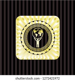 man lifting world icon inside gold badge or emblem
