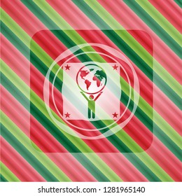 man lifting world icon inside christmas badge background.