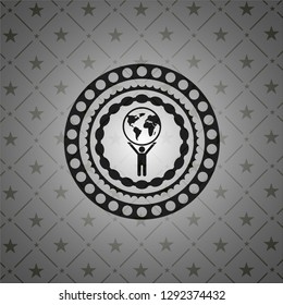man lifting world icon inside black emblem. Vintage.