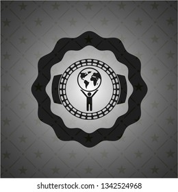 man lifting world icon inside realistic dark emblem