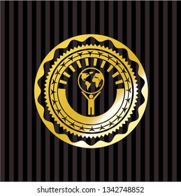 man lifting world icon inside golden badge or emblem