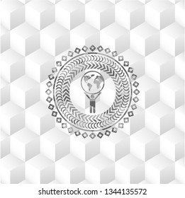 man lifting world icon inside realistic grey emblem with geometric cube white background