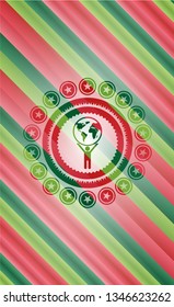 man lifting world icon inside christmas colors emblem.