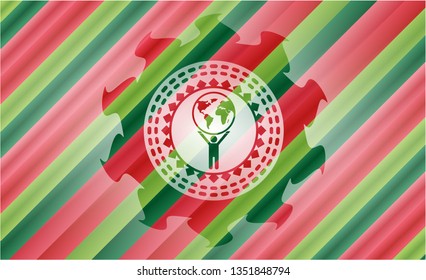 man lifting world icon inside christmas badge background.