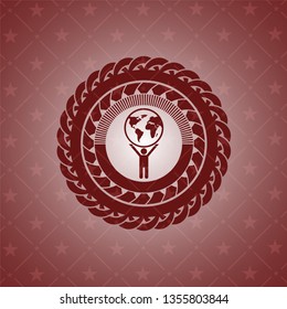 man lifting world icon inside vintage red emblem