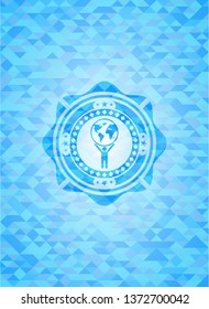 man lifting world icon inside sky blue emblem with mosaic ecological style background