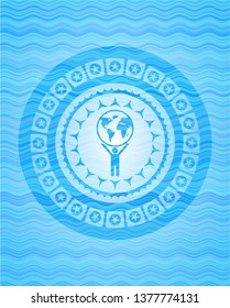 man lifting world icon inside water concept badge background.