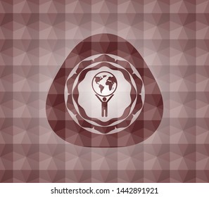 man lifting world icon inside red seamless polygonal badge.