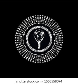 man lifting world icon inside chalkboard emblem written on a blackboard