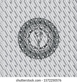 man lifting world icon inside silver shiny badge. Scales pattern. Vector Illustration. Detailed.