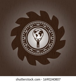man lifting world icon inside vintage wood emblem