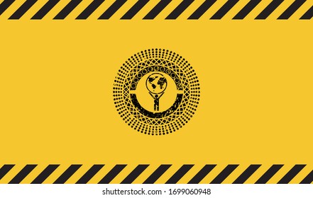 man lifting world icon inside warning sign, black grunge emblem. Vector Illustration. Detailed.
