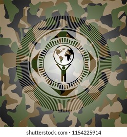 man lifting world icon on camouflaged texture