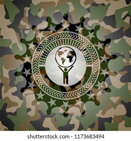 man lifting world icon on camo texture