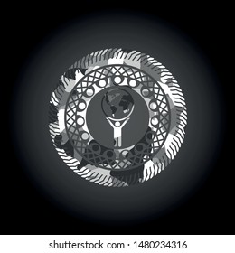 man lifting world icon on grey camouflaged pattern