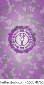 man lifting world icon on pink camo pattern