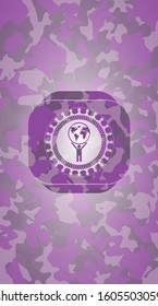 man lifting world icon on pink camo pattern