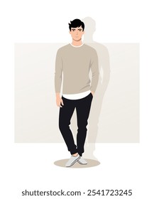 A man in a light gray sweater and dark trousers stands relaxed in a confident pose. Fashionable casual look, minimalist background enhances the emphasis on the character.