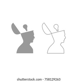 Man with  lightbulb idea in open head grey icon .