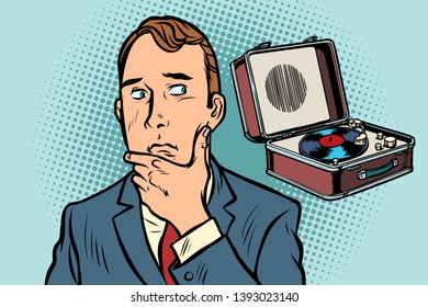 the man listens carefully to music. old vinyl record player. Comic cartoon pop art vector retro vintage drawing