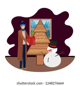 man in livingroom with christmas tree